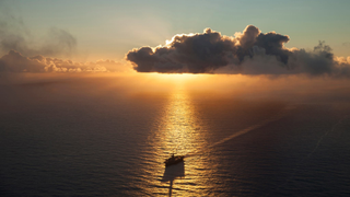 Check Out What Led To This Gorgeous Photo Of The USS <i>Ronald Reagan</i> Sailing Off Japan